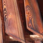 égetett, kezelt vörösfenyő anyag